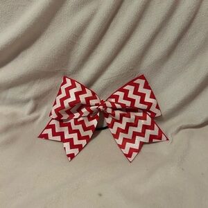 Red and white sparkly hair bow.